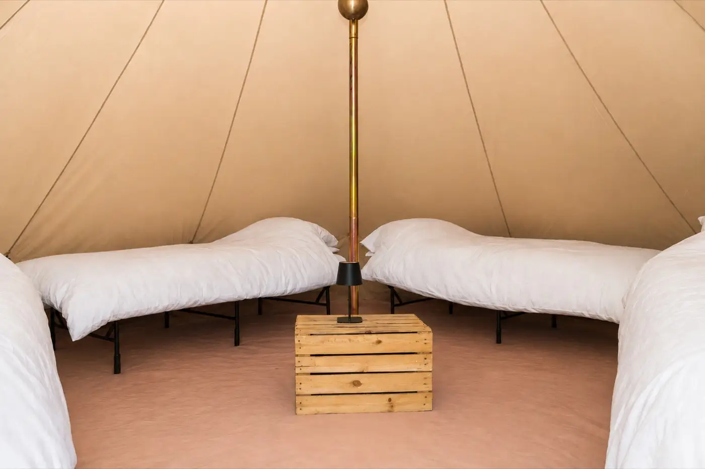 An Essentials tent with two single beds